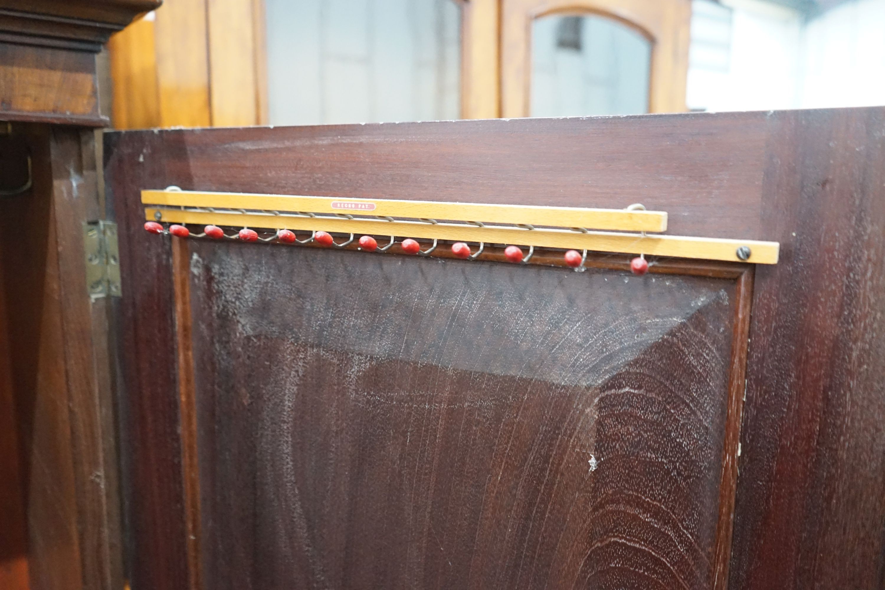 A 1920's mahogany wardrobe, width 126cm, depth 52cm, height 181cm